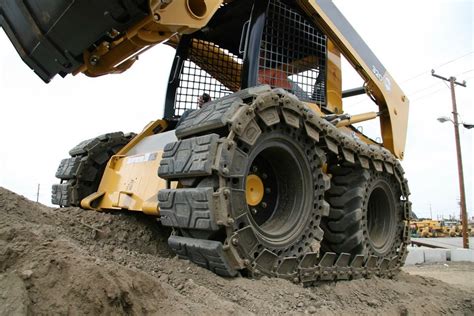 tires vs tracks skid steer|mounted skid steer tires.